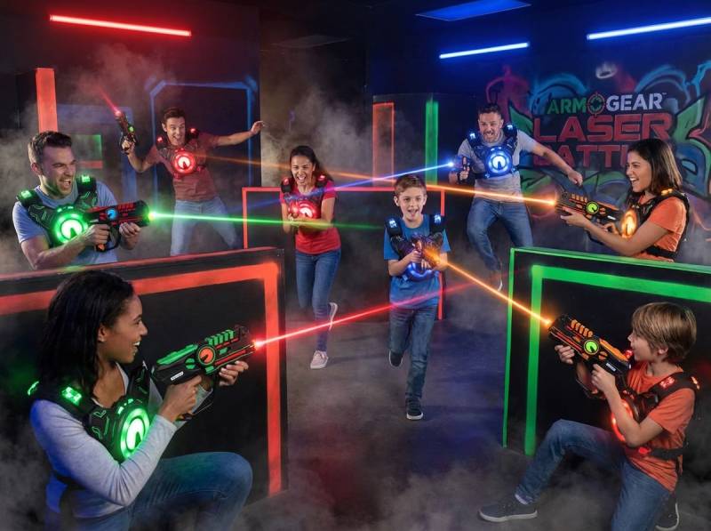 Father and son playing laser tag